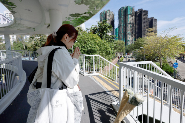 Hong Kong mourns victims of high-rise apartments complex blaze